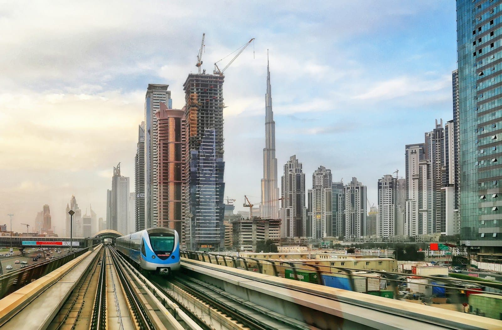 A Dubai Metro train passing the city's towers