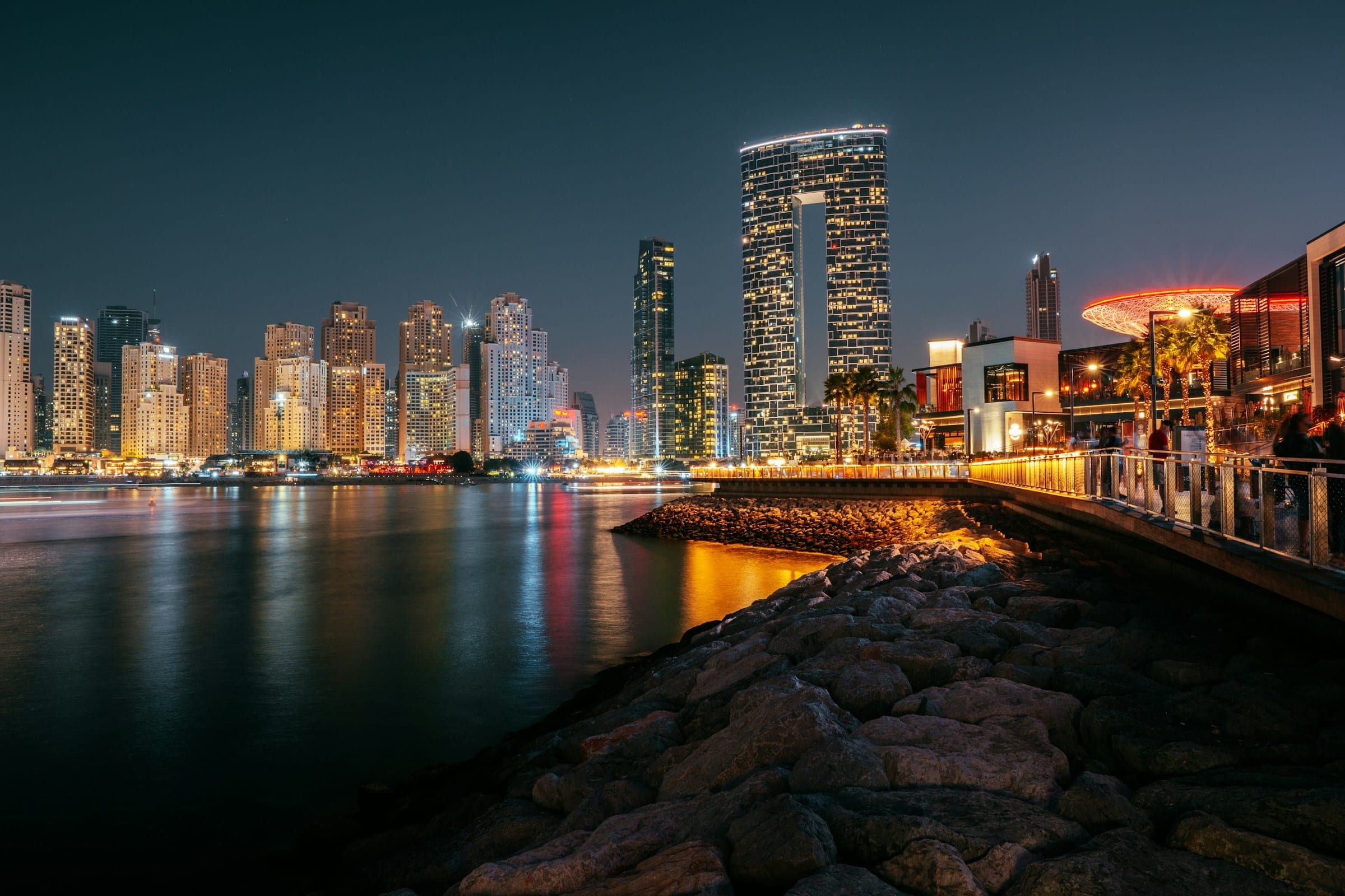 The Dubai skyline across the water at night